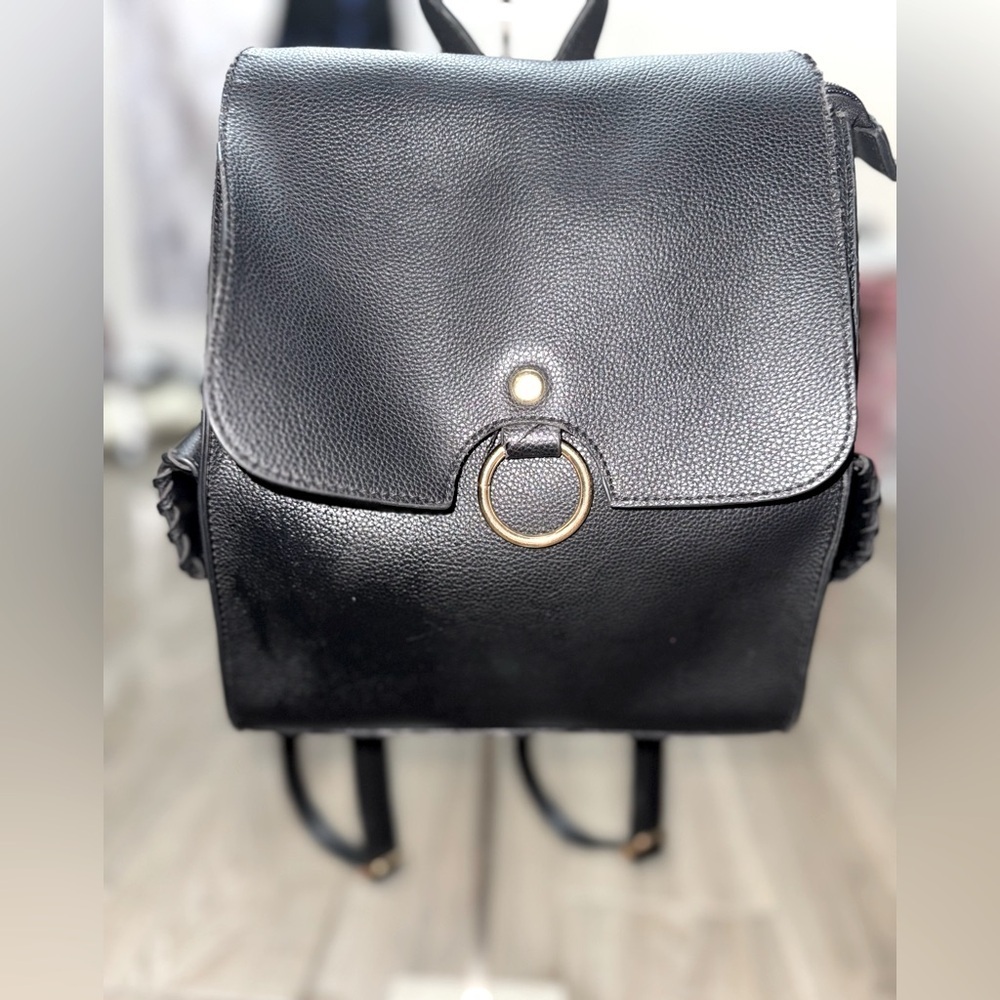 "Blake Mini Backpack Purse  in Black" by Foley + Corinna.
